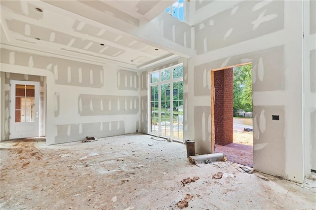 unfurnished living room with a wealth of natural light