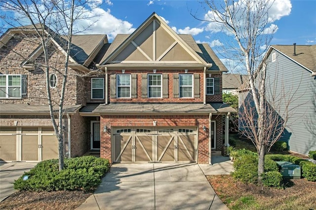 view of front of home featuring brick siding, concrete driveway, and a garage