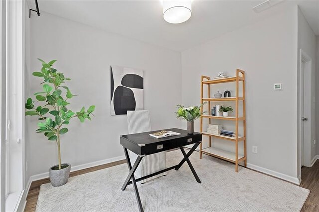 office featuring hardwood / wood-style flooring