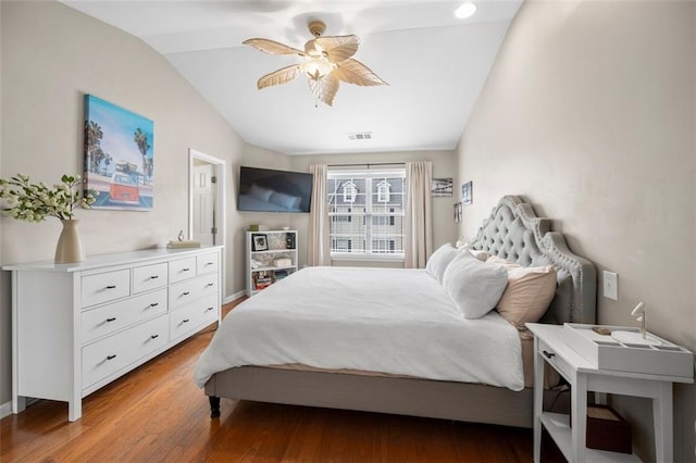 3542 Chattahoochee Summit Ln SE, Atlanta, GA 30339 - bedroom with lofted ceiling, light wood-style floors, and a ceiling fan