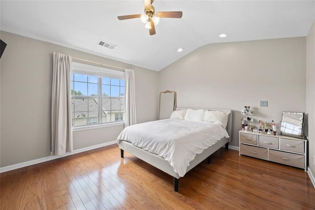 3542 Chattahoochee Summit Ln SE, Atlanta, GA 30339 - bedroom featuring wood finished floors, vaulted ceiling, baseboards, recessed lighting, and a ceiling fan