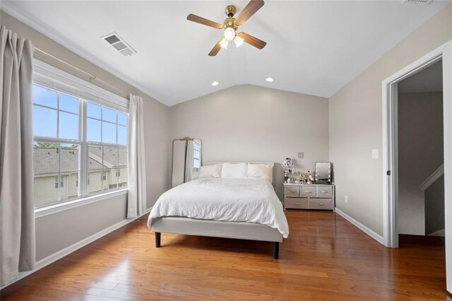 3542 Chattahoochee Summit Ln SE, Atlanta, GA 30339 - bedroom with wood finished floors, lofted ceiling, baseboards, recessed lighting, and ceiling fan