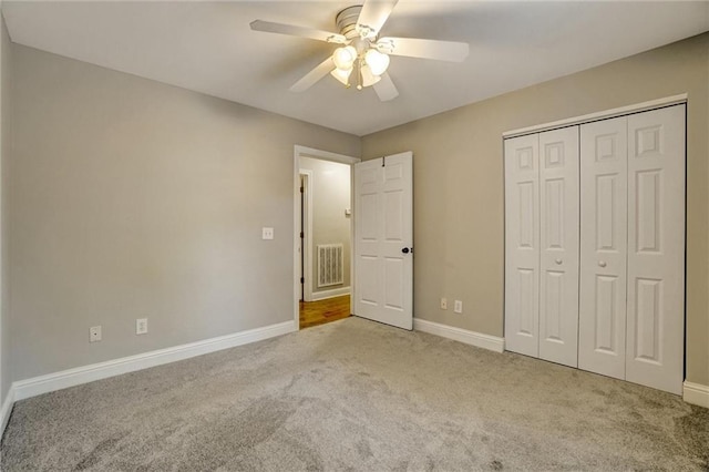 209 Jacobs Way, Jasper, GA 30143 - unfurnished bedroom with carpet, a closet, and a ceiling fan