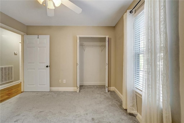 209 Jacobs Way, Jasper, GA 30143 - unfurnished bedroom featuring carpet floors, a closet, and a ceiling fan