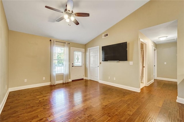 209 Jacobs Way, Jasper, GA 30143 - unfurnished living room featuring a ceiling fan, wood finished floors, lofted ceiling, and attic access