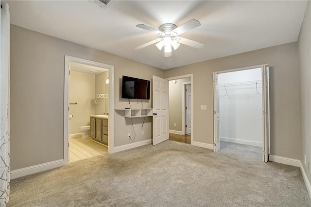 209 Jacobs Way, Jasper, GA 30143 - unfurnished bedroom with light carpet, a closet, connected bathroom, and a ceiling fan