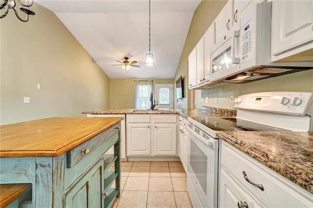 209 Jacobs Way, Jasper, GA 30143 - kitchen featuring white appliances, vaulted ceiling, white cabinets, a peninsula, and light tile patterned floors