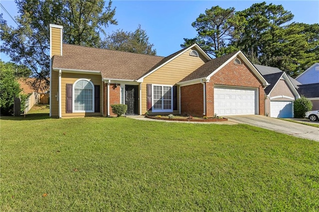 view of front of property featuring a front yard and a garage