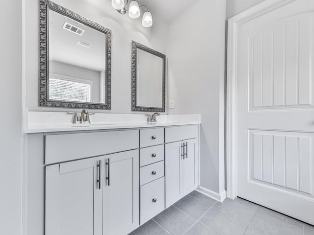 212 Torch Dr, Acworth, GA 30102 - bathroom featuring double vanity and tile patterned flooring