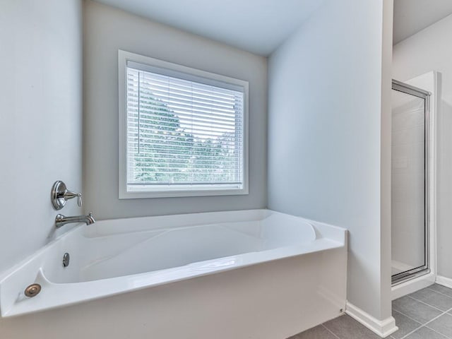 212 Torch Dr, Acworth, GA 30102 - bathroom with a garden tub, tile patterned floors, and a stall shower