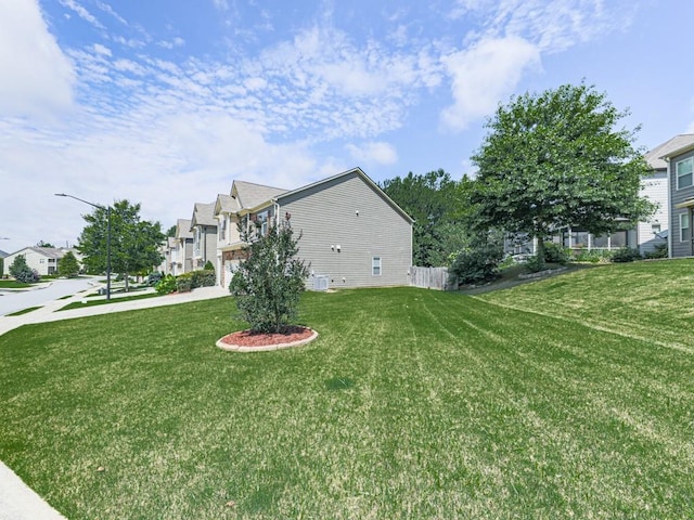 212 Torch Dr, Acworth, GA 30102 - view of property exterior featuring concrete driveway, a residential view, a lawn, and an attached garage