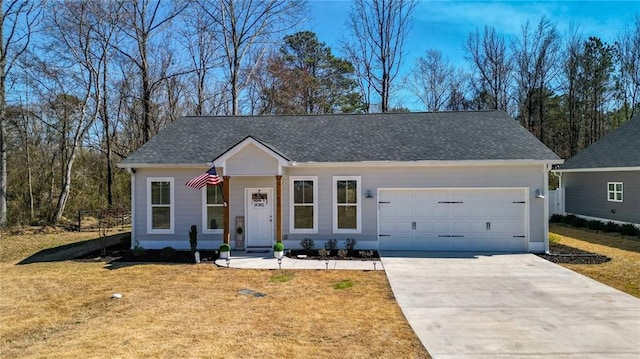 ranch-style home featuring an attached garage, roof with shingles, concrete driveway, and a front yard