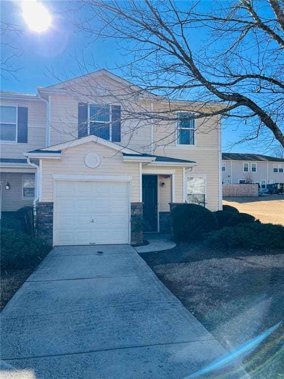 view of front of property with a garage