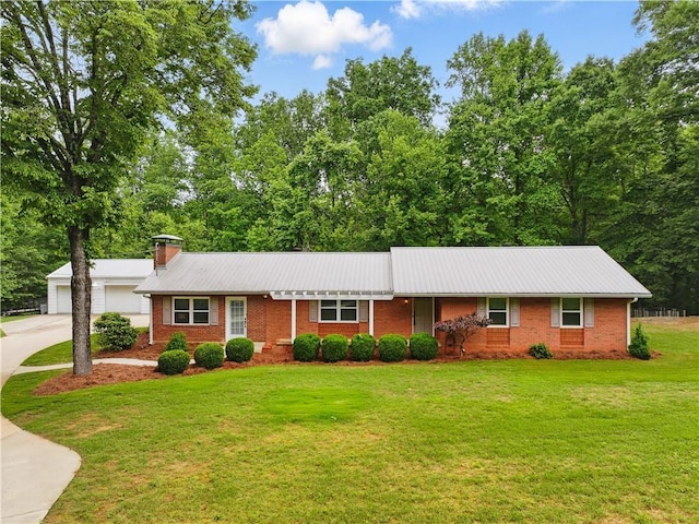 3110 Springdale Park Cir, Gainesville, GA 30506 - ranch-style home featuring metal roof, a front yard, brick siding, and a chimney
