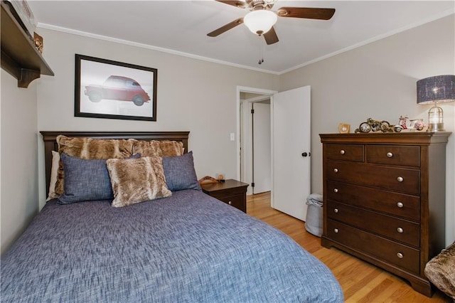 3110 Springdale Park Cir, Gainesville, GA 30506 - bedroom with light wood-style flooring, crown molding, and a ceiling fan