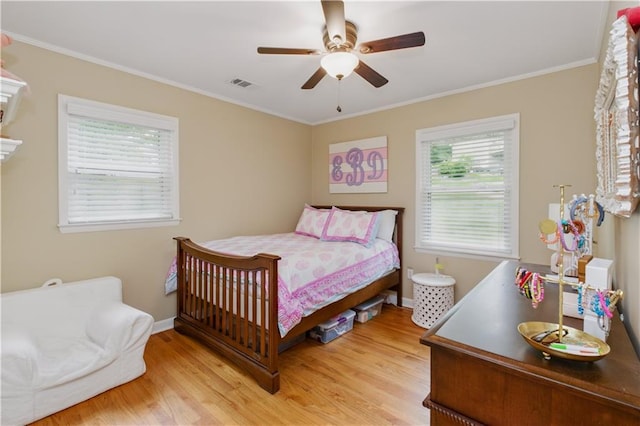 3110 Springdale Park Cir, Gainesville, GA 30506 - bedroom featuring light wood-type flooring, crown molding, ceiling fan, and baseboards