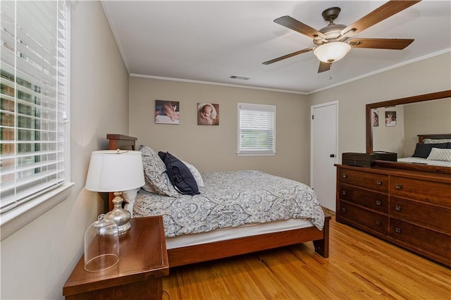 3110 Springdale Park Cir, Gainesville, GA 30506 - bedroom with crown molding, wood finished floors, and a ceiling fan