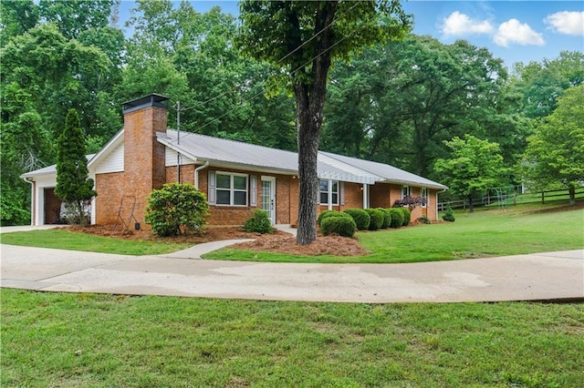 3110 Springdale Park Cir, Gainesville, GA 30506 - ranch-style home featuring brick siding, a chimney, concrete driveway, and an attached garage