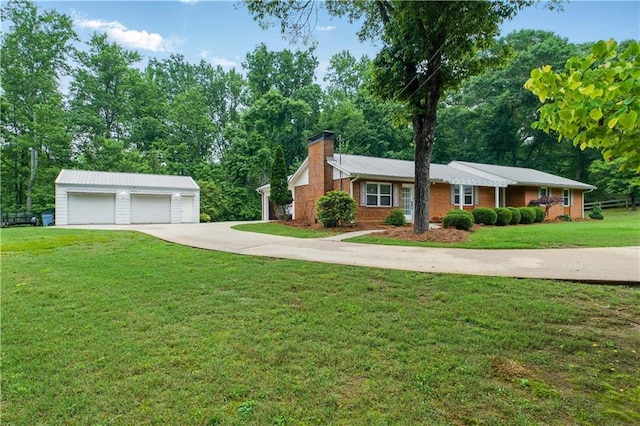 3110 Springdale Park Cir, Gainesville, GA 30506 - view of front facade with an outdoor structure, a chimney, brick siding, a detached garage, and a front yard