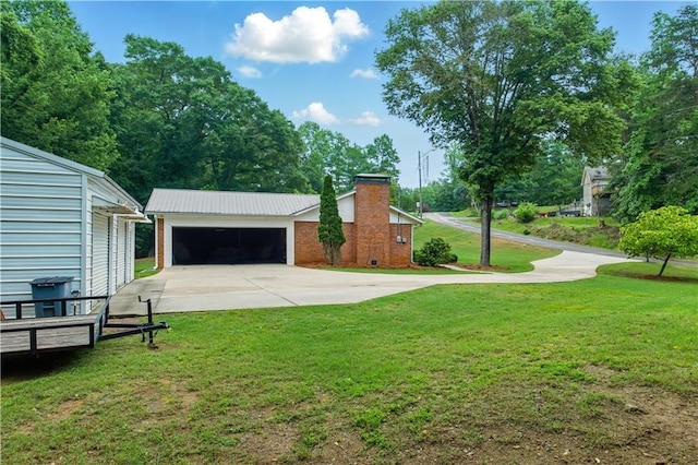 3110 Springdale Park Cir, Gainesville, GA 30506 - view of grassy yard with driveway and an attached garage