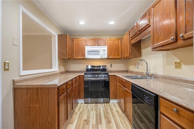 205 Peachtree Forest Ter, Peachtree Corners, GA 30092 - kitchen with white microwave, stainless steel gas range oven, black dishwasher, brown cabinets, and crown molding