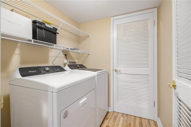 205 Peachtree Forest Ter, Peachtree Corners, GA 30092 - washroom with separate washer and dryer and light wood finished floors