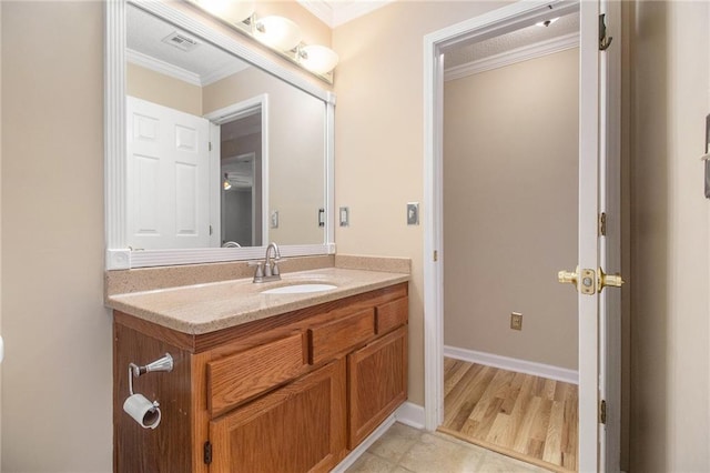205 Peachtree Forest Ter, Peachtree Corners, GA 30092 - bathroom featuring crown molding and vanity