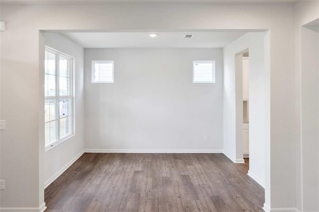 empty room featuring hardwood / wood-style floors