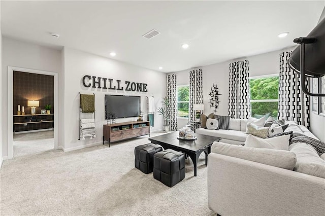 living room featuring light carpet