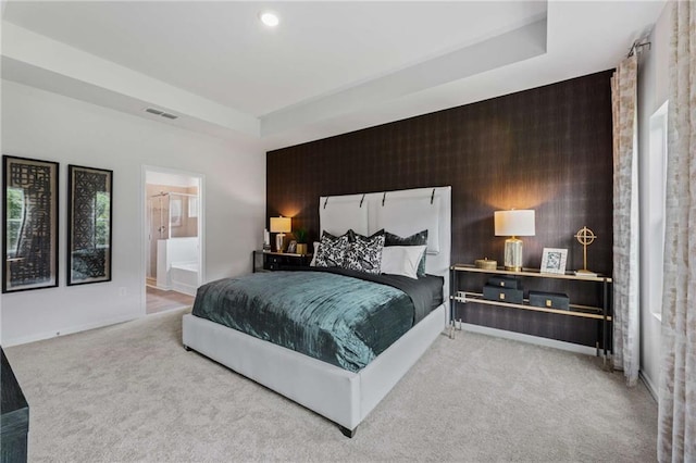 bedroom featuring light carpet