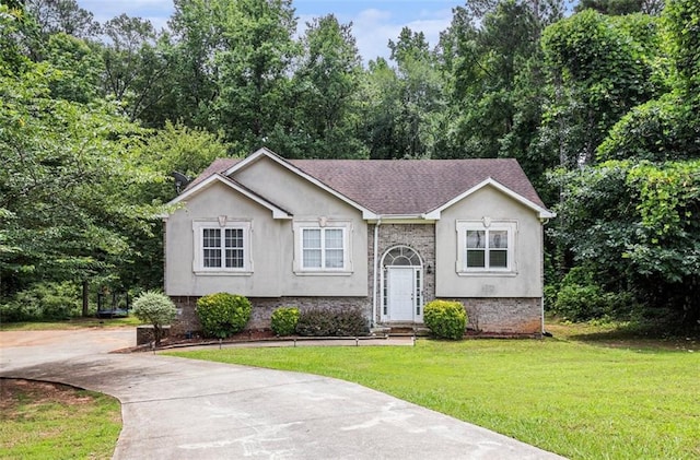 3514 Blackberry Ln SE, Conyers, GA 30094 - raised ranch featuring a front lawn, stucco siding, concrete driveway, and a shingled roof
