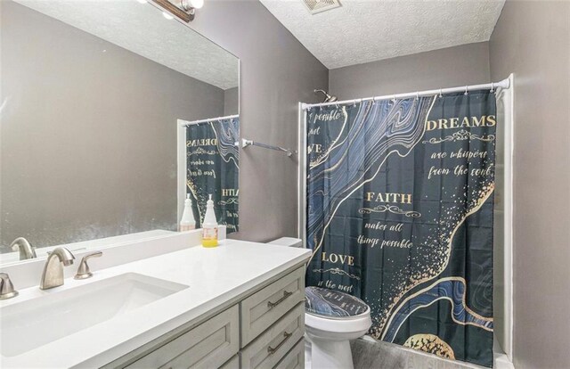 3514 Blackberry Ln SE, Conyers, GA 30094 - bathroom featuring a textured ceiling, vanity, curtained shower, and wood finished floors