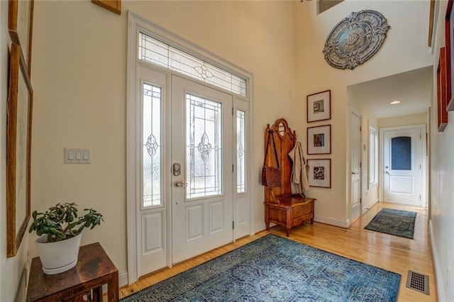 foyer entrance featuring light wood-type flooring