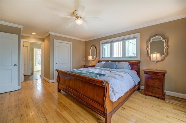 bedroom with ceiling fan, light hardwood / wood-style flooring, and crown molding