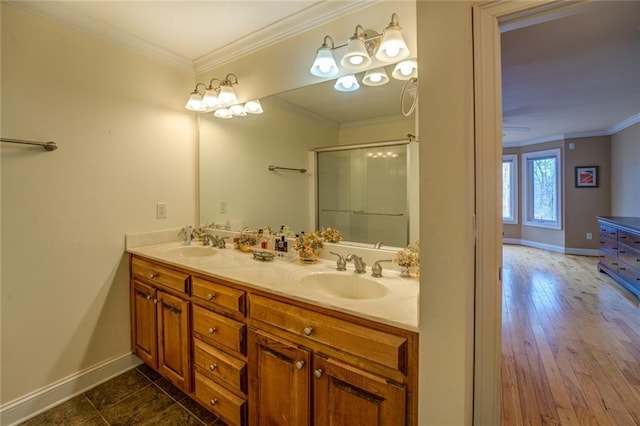 bathroom featuring dual vanity, crown molding, and tile flooring