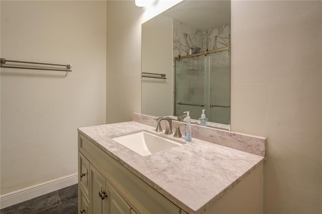 bathroom featuring tile floors and vanity