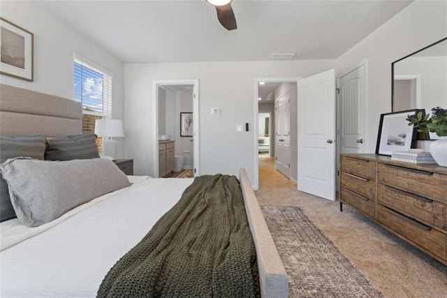 227 Ivey Ter Unit 36, Temple, GA 30179 - bedroom with light carpet, ensuite bathroom, and a ceiling fan