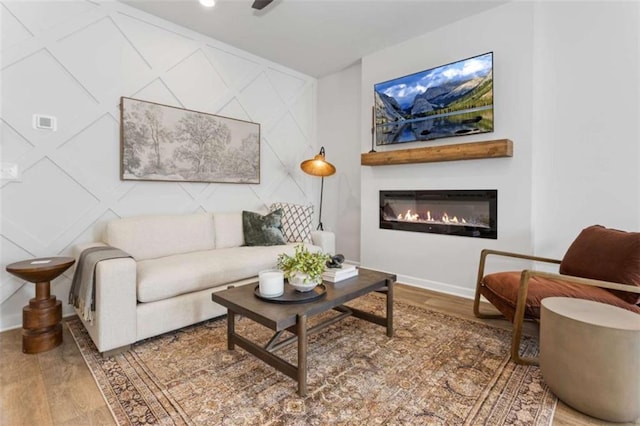 227 Ivey Ter Unit 36, Temple, GA 30179 - living room with wood finished floors and a glass covered fireplace