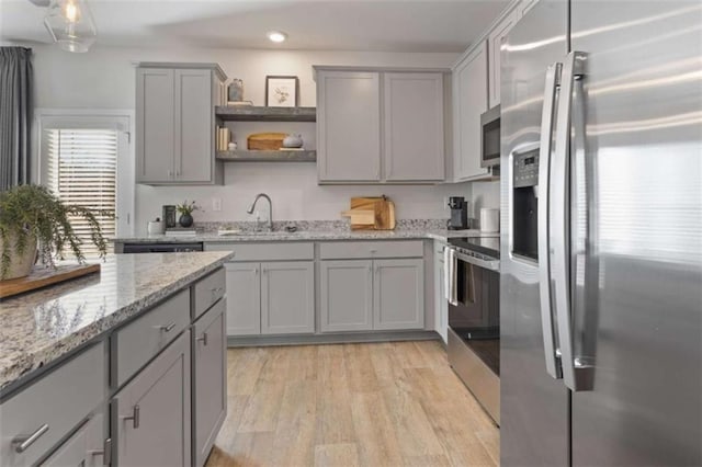 227 Ivey Ter Unit 36, Temple, GA 30179 - kitchen with appliances with stainless steel finishes, gray cabinets, open shelves, light wood-style floors, and recessed lighting