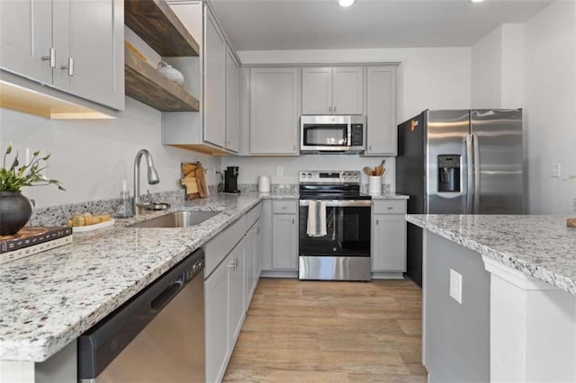 227 Ivey Ter Unit 36, Temple, GA 30179 - kitchen with appliances with stainless steel finishes, gray cabinets, open shelves, light wood-style flooring, and recessed lighting
