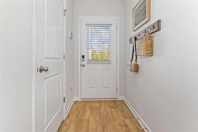 227 Ivey Ter Unit 36, Temple, GA 30179 - doorway featuring light wood-style floors and baseboards