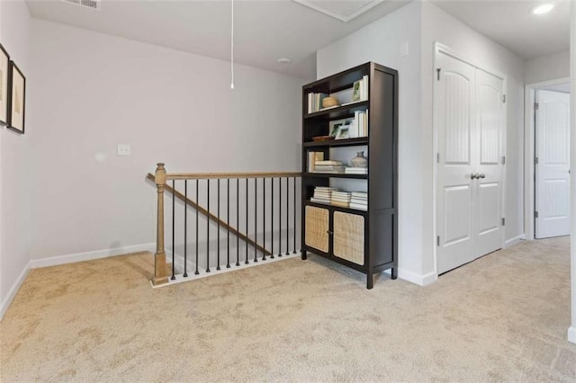 227 Ivey Ter Unit 36, Temple, GA 30179 - hall with an upstairs landing, carpet floors, and attic access