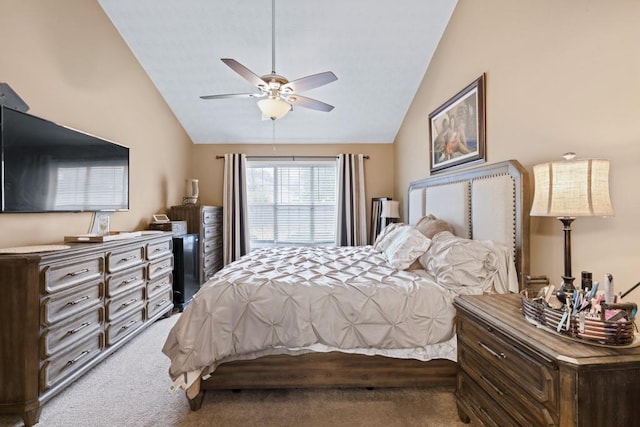 carpeted bedroom with lofted ceiling and ceiling fan