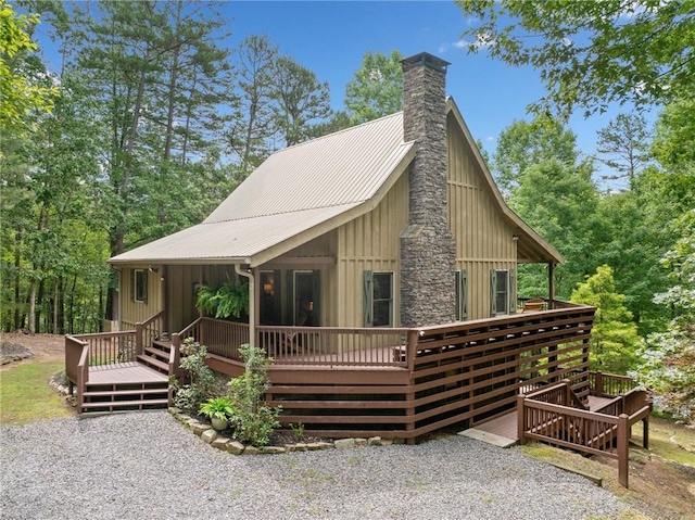 85 Misty Hollow Rdg, Ellijay, GA 30536 - chalet / cabin featuring a wooden deck, a chimney, a metal roof, and board and batten siding