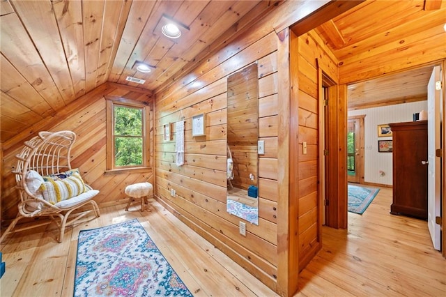 85 Misty Hollow Rdg, Ellijay, GA 30536 - living area featuring wooden walls, lofted ceiling, light wood finished floors, and wood ceiling