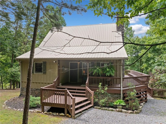 85 Misty Hollow Rdg, Ellijay, GA 30536 - back of house featuring a chimney, a metal roof, and a deck