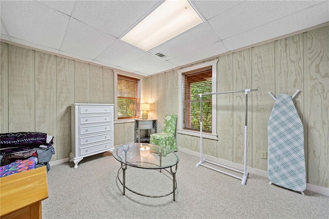 85 Misty Hollow Rdg, Ellijay, GA 30536 - living area featuring carpet flooring, wooden walls, and a paneled ceiling