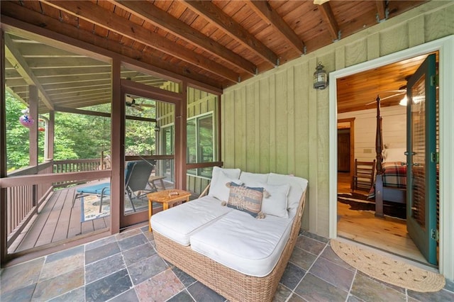 85 Misty Hollow Rdg, Ellijay, GA 30536 - sunroom featuring a ceiling fan, plenty of natural light, and beamed ceiling
