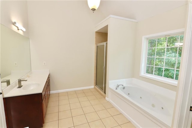 bathroom featuring separate shower and tub, tile patterned flooring, and vanity