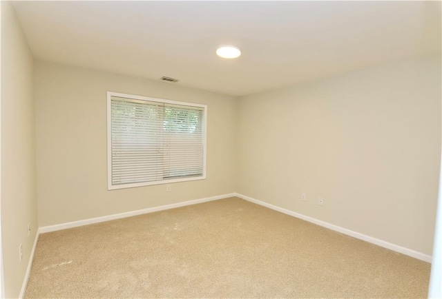 empty room with light carpet